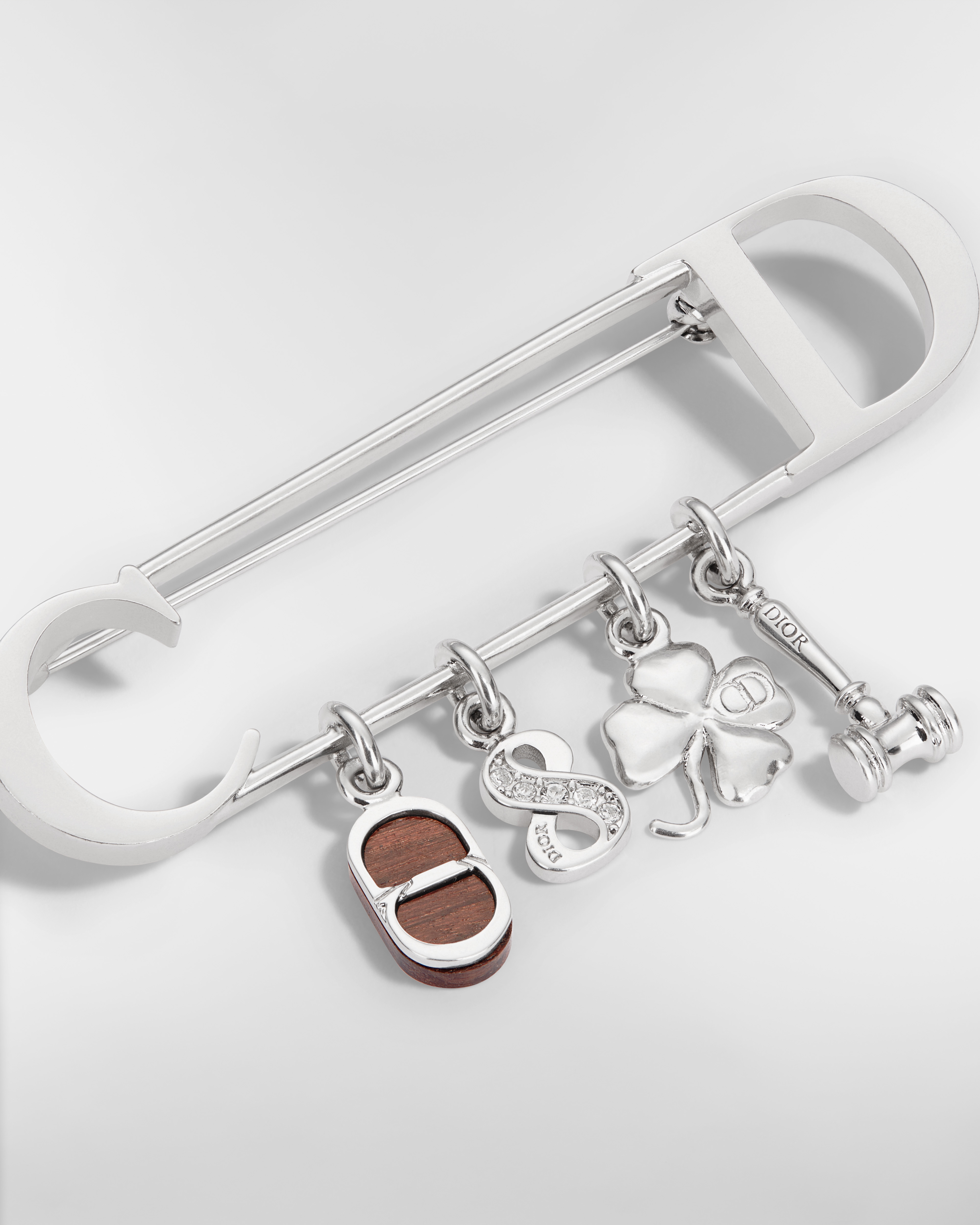 Spilla Knock on Wood Ottone con finitura color argento, legno di Santos e cristalli bianchi E09